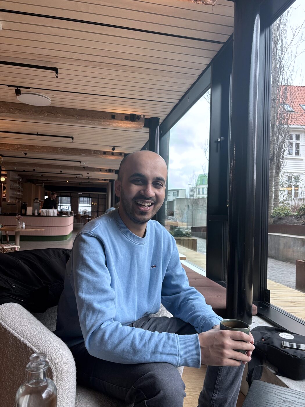 Prasad working from a café in Norway