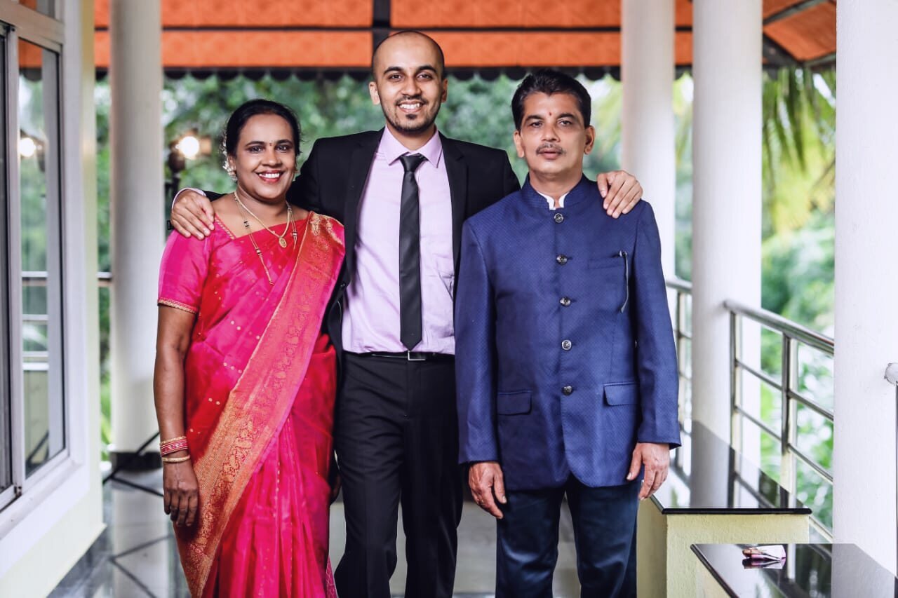 Prasad with his parents